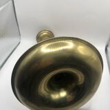 Candle holder with a pusher