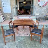 Set of 6 chairs and dining room table with extensions “BCM” circa 1960