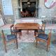 Ensemble de 6 chaises et sa table de salle à manger avec rallonges « BCM » vers 1960