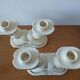 Pair of cream ceramic candlesticks with gold trim circa 1930-1950