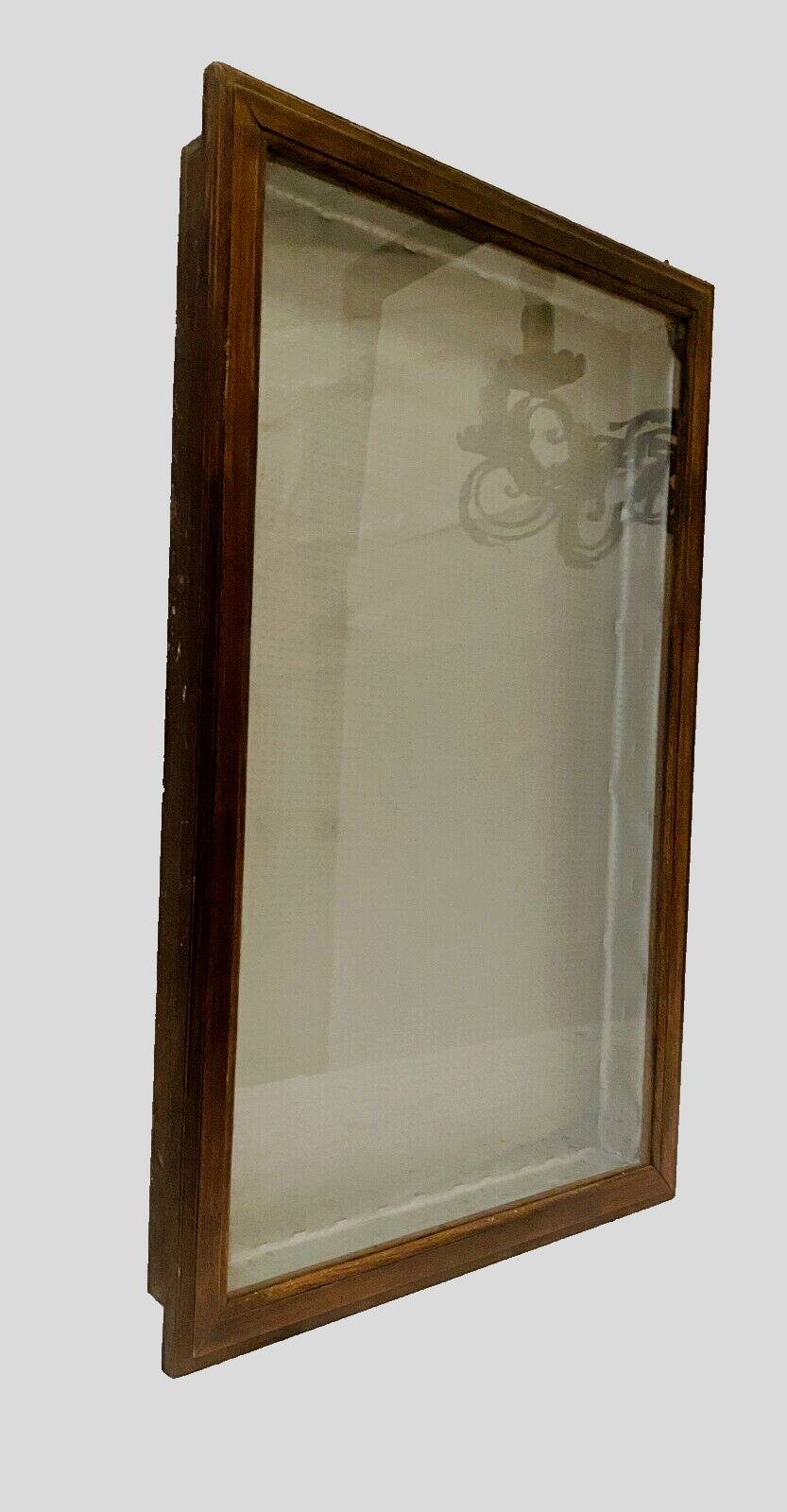 Wall display case with a solid oak door