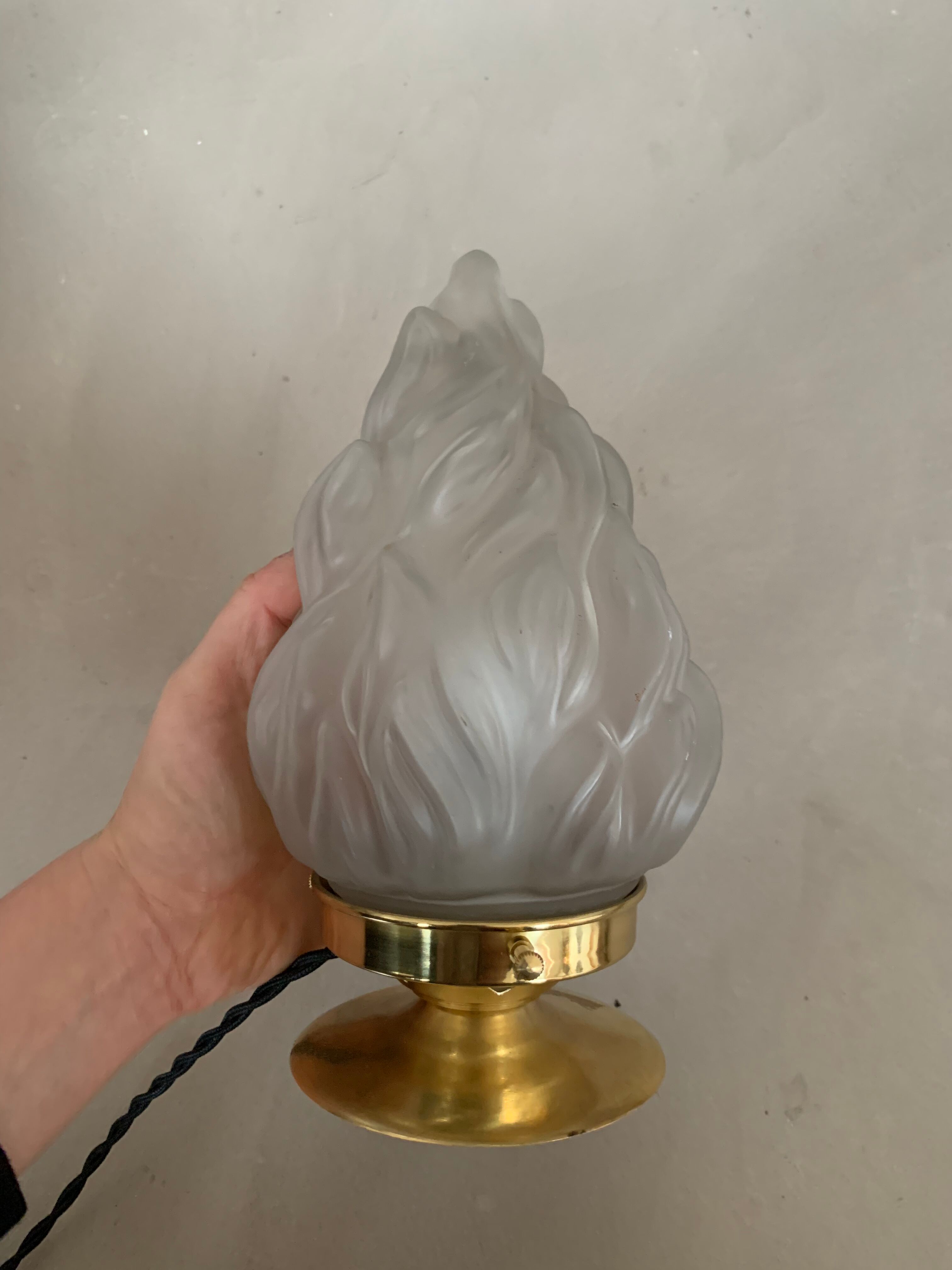 Old laying flame lamp