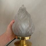 Old laying flame lamp