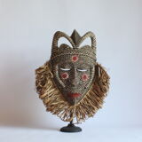 African mask with raffia and kaolin dots