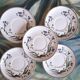 Lot de 5 sous tasses "Myosotis" du service Botanica de Boch