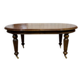 Victorian style oval mahogany table with 1 extension.