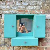 Old wall-mounted bathroom cabinet