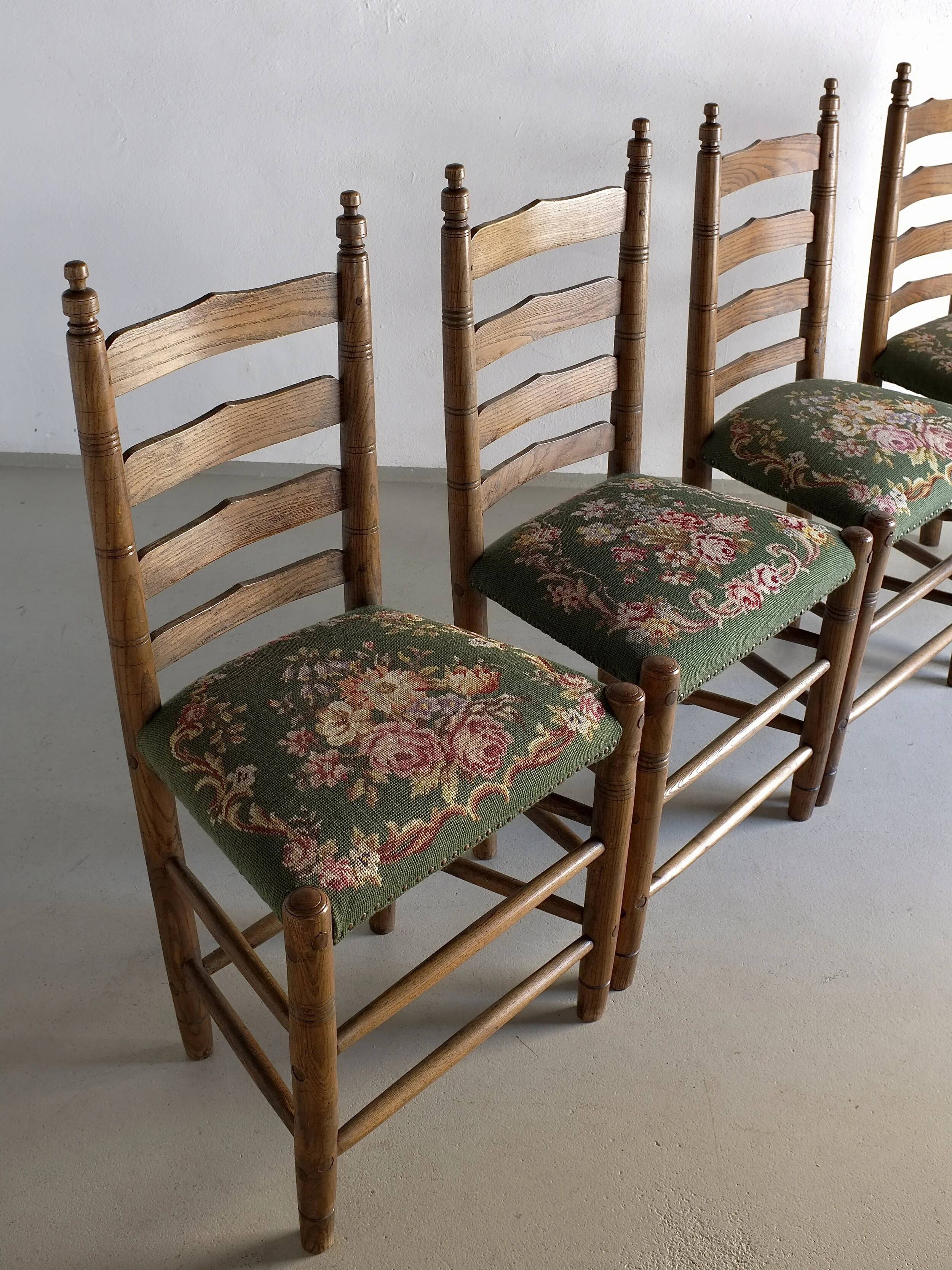 Rustic ladder-back oak chairs with embroidered seats | Netherlands | 1950s