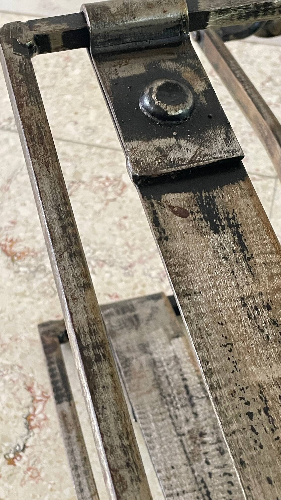 Brutalist vintage steel magazine rack