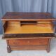 Secretary commode with a cross design from the Restoration period in walnut.