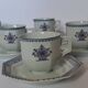6 tasses et sous-tasses Limoges Coquet forme Lotus