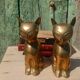 Gold-plated brass bookend cat