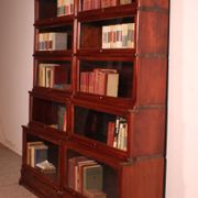 pair of Globe Wernicke London 'waterfall' bookcases in mahogany circa