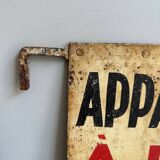 Old plaque “Apartments for rent”