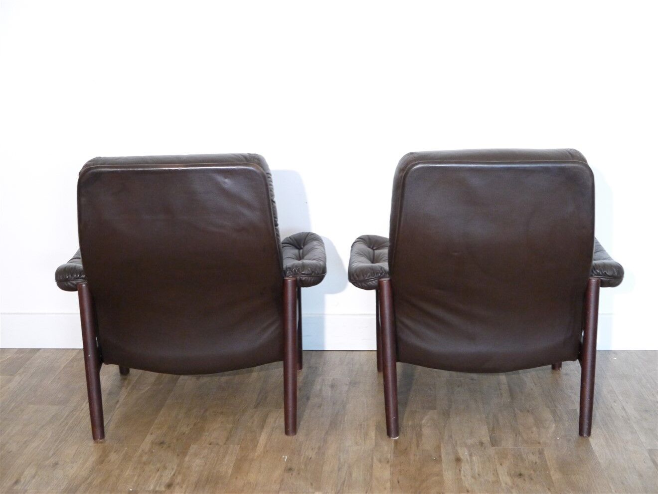 Pair of Scandinavian leather armchairs with ottomans 1970