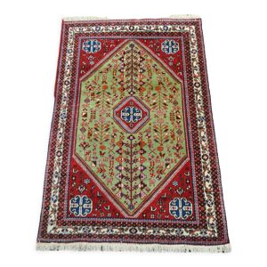 Tapis persan authentique milieu