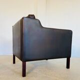 Mid-century Stouby leather lounge chair and stool in brown leather