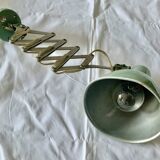 Workshop lamp on accordion arm.