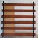 Vintage teak wall coat rack with 5 hooks and mirror.