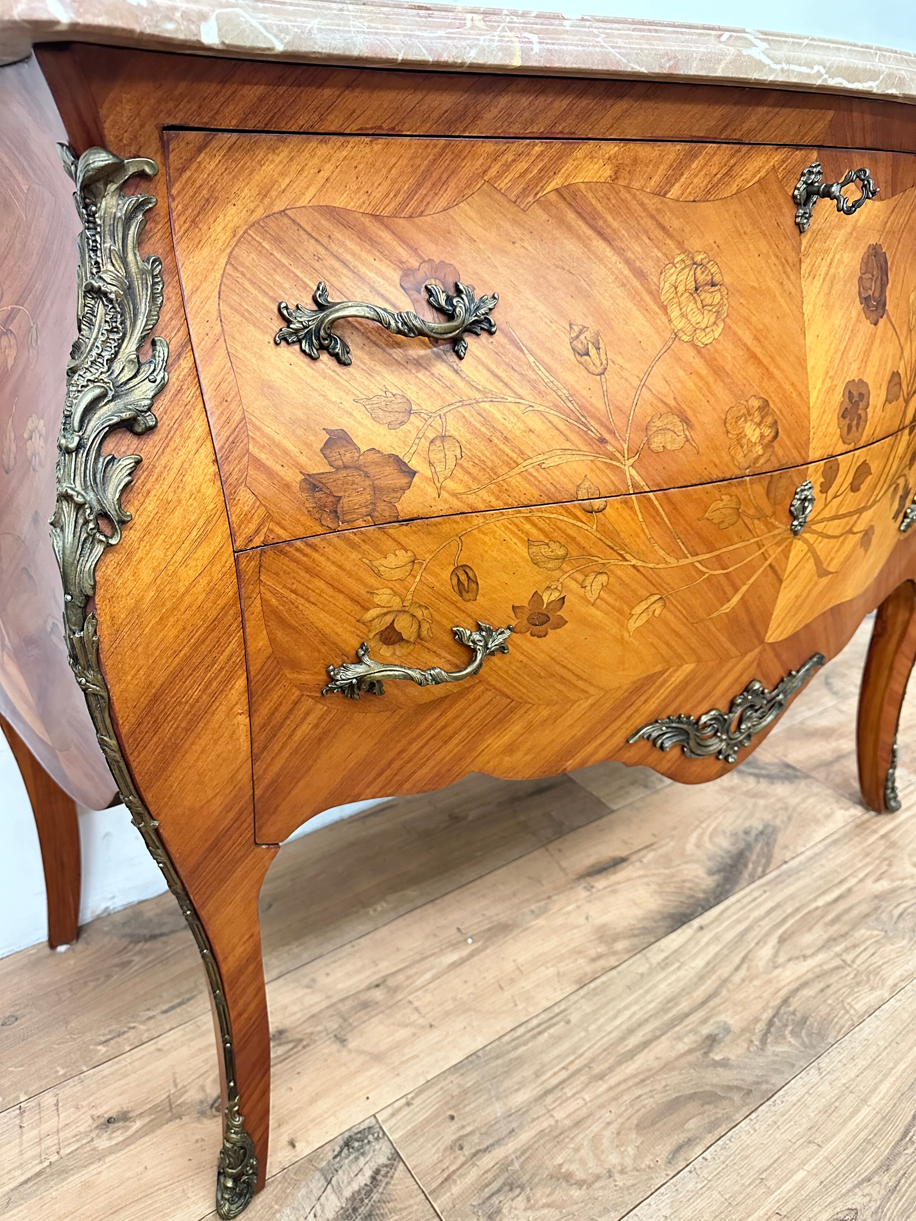 Curved chest of drawers in Louis XV style