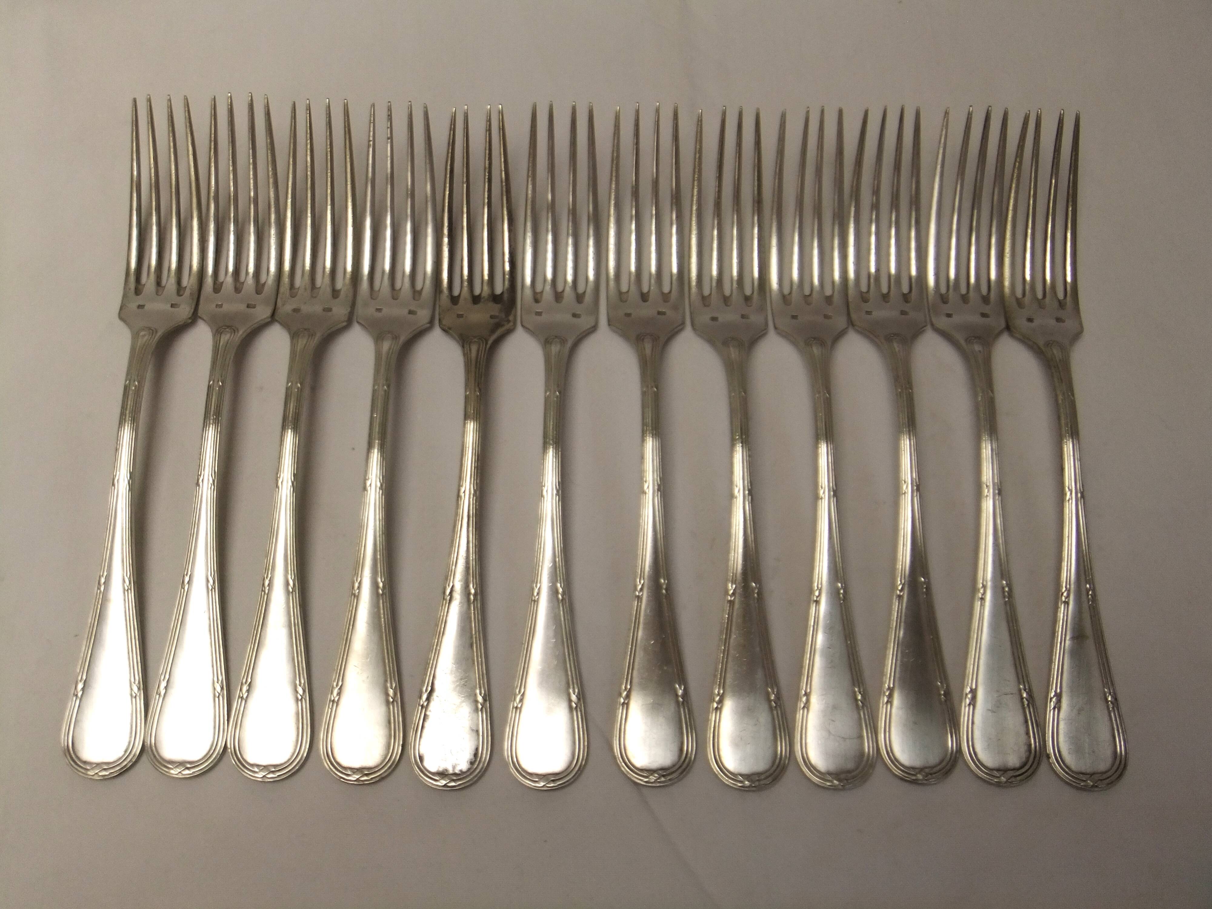 Old Louis XVI service fork with mesh ribbon