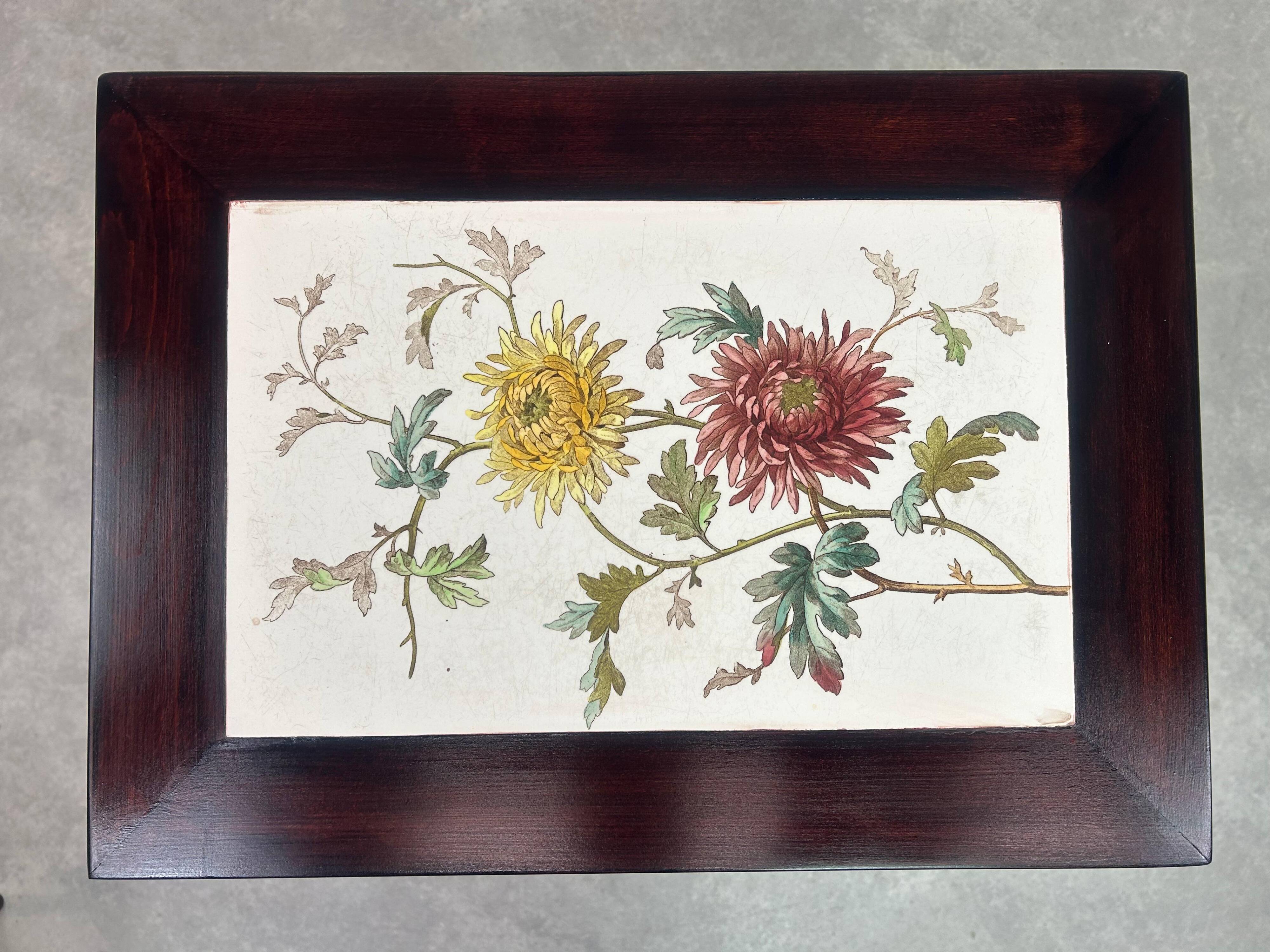 Nested tables in curved wood with ceramic top by Thonet.