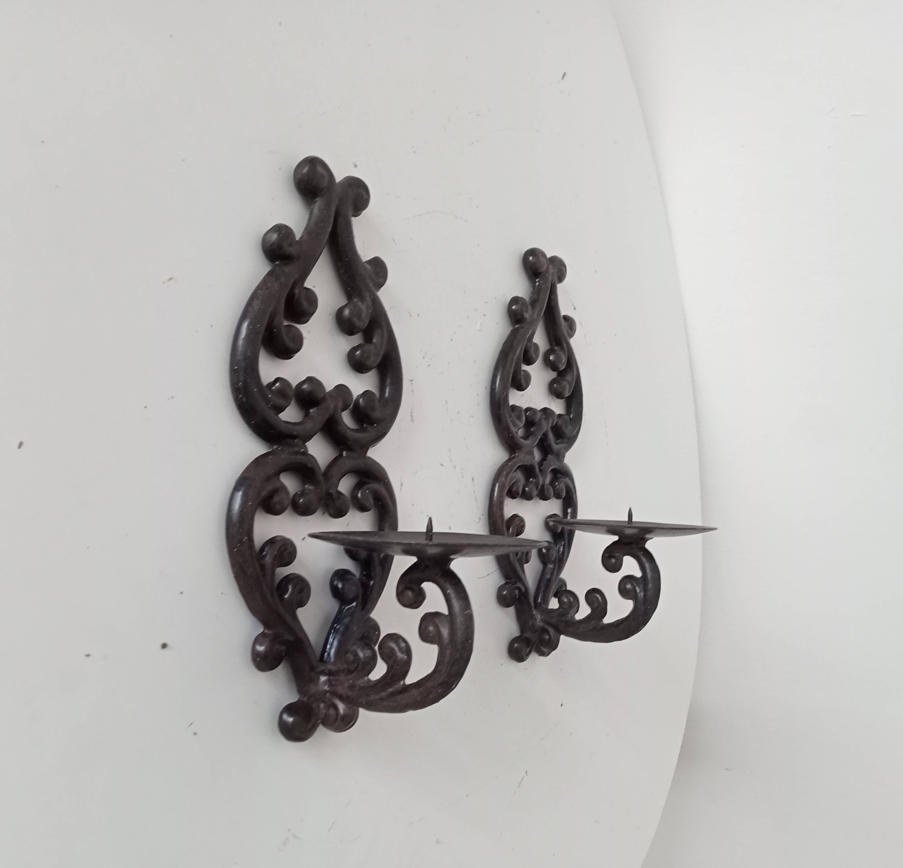 Antique wall candle holder in enamelled cast iron