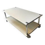 Vintage steel coffee table from the 1970s on wheels.