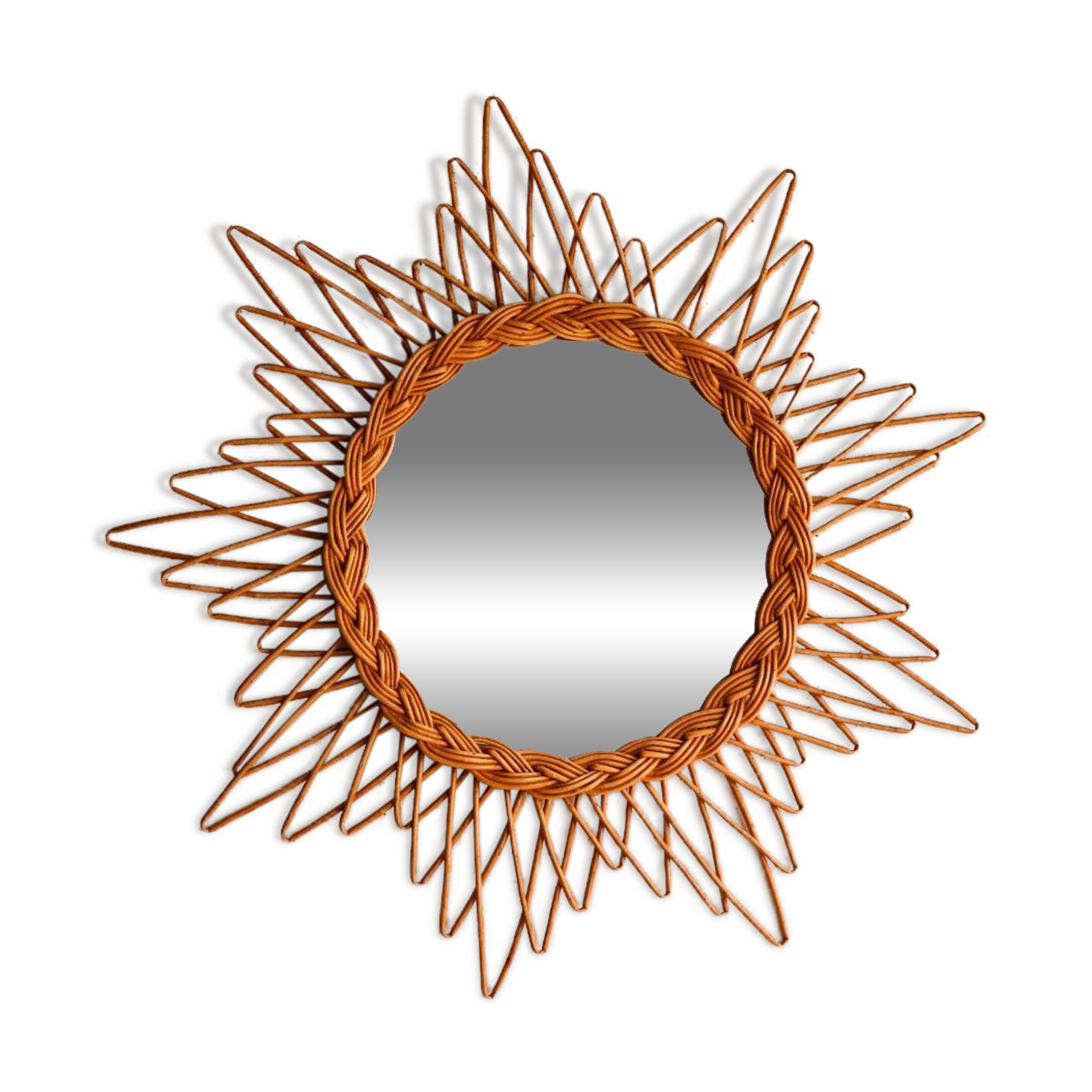 Vintage sun mirror in woven rattan