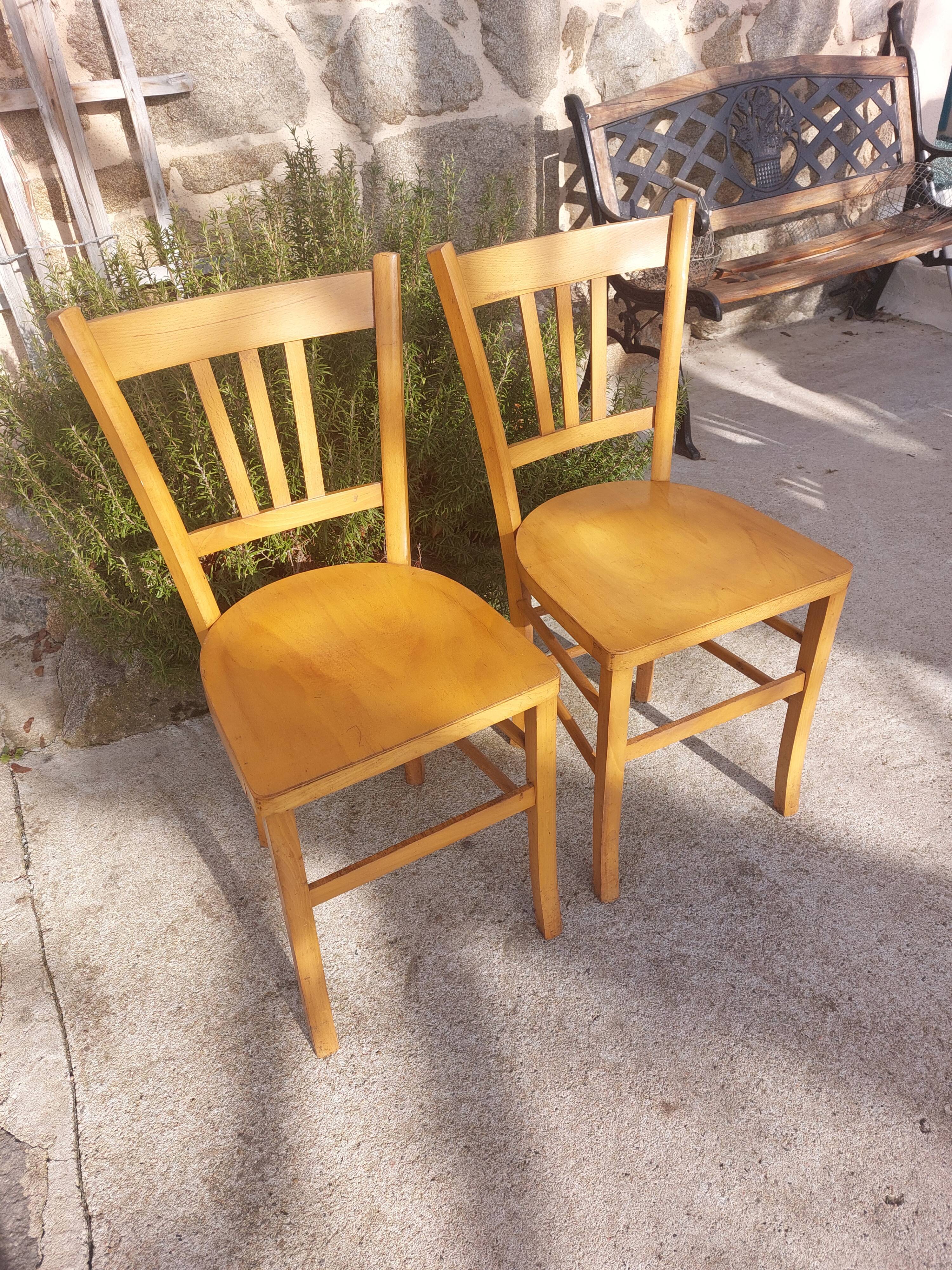 pair of Luterma style bistro chairs