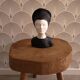 Bust of a woman in anthracite and white plaster