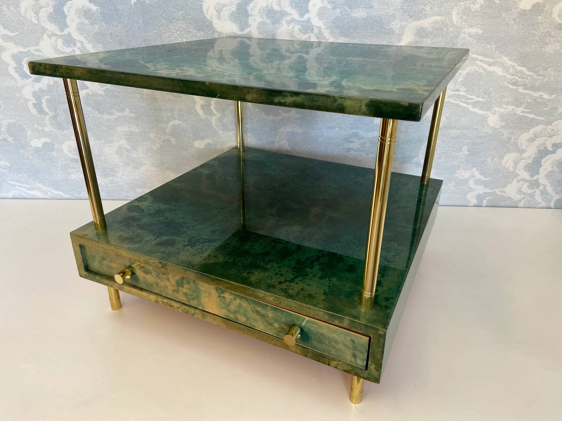 Aldo Tura side table in aqua green with brass legs and lower drawer.