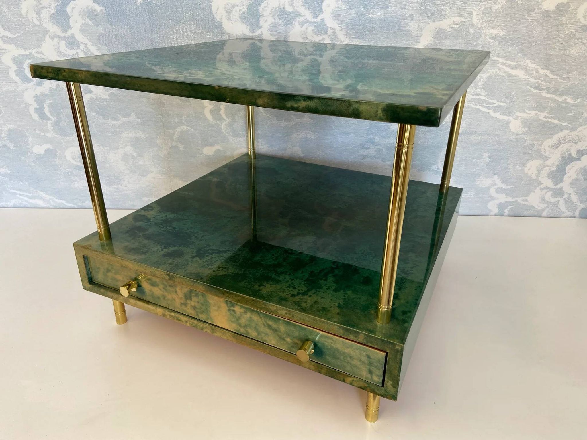 Aldo Tura side table in aqua green with brass legs and lower drawer.