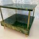 Aldo Tura side table in aqua green with brass legs and lower drawer.