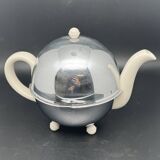 Ceramic and metal teapot with felt insulation