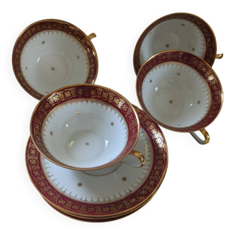 Gold and burgundy cups and saucers