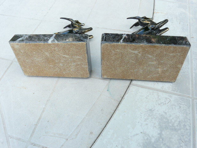 Pair of greenhouse book antelope in regulation on marble base