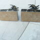 Pair of greenhouse book antelope in regulation on marble base