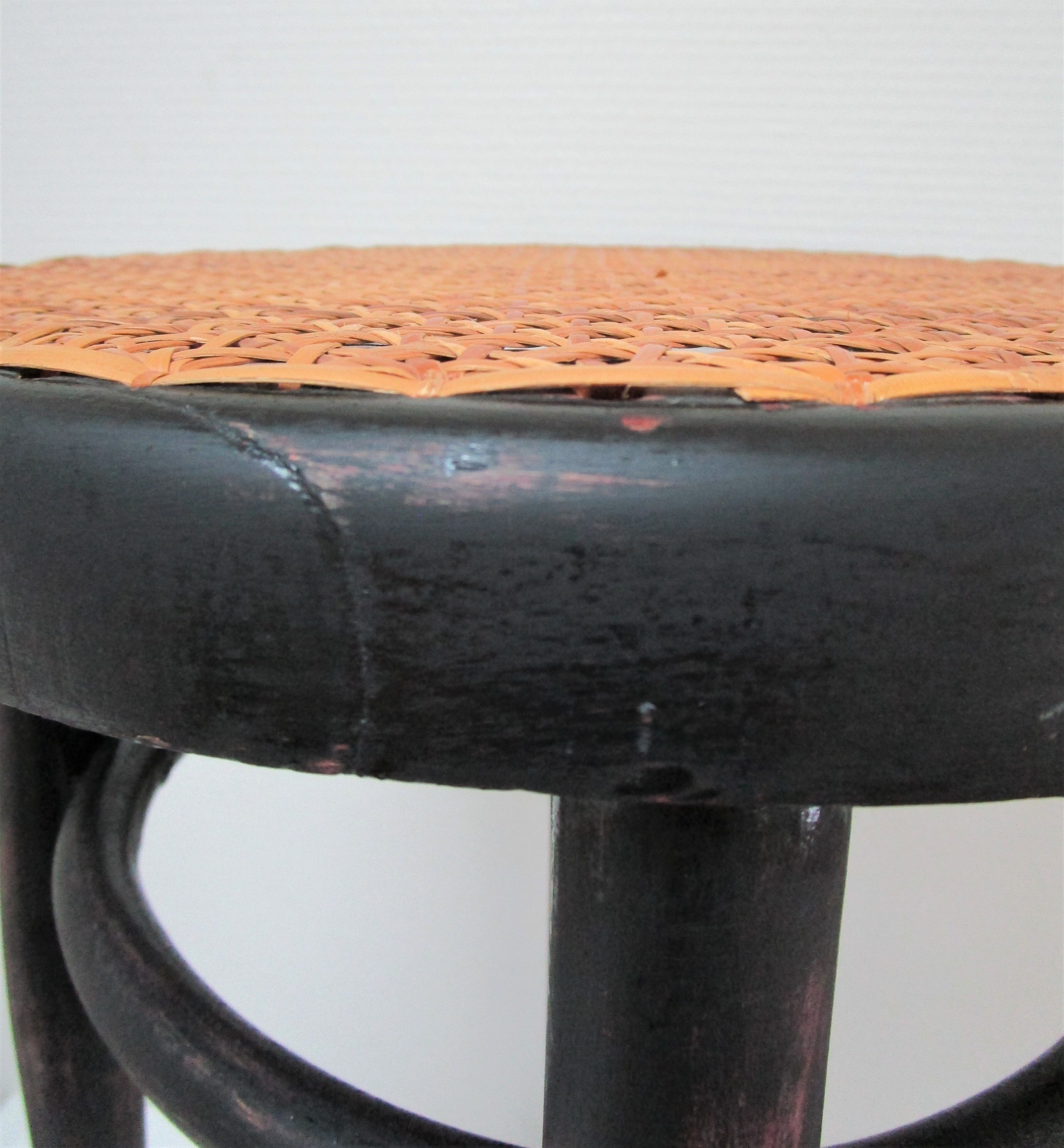 Black skated Thonet stool stamped