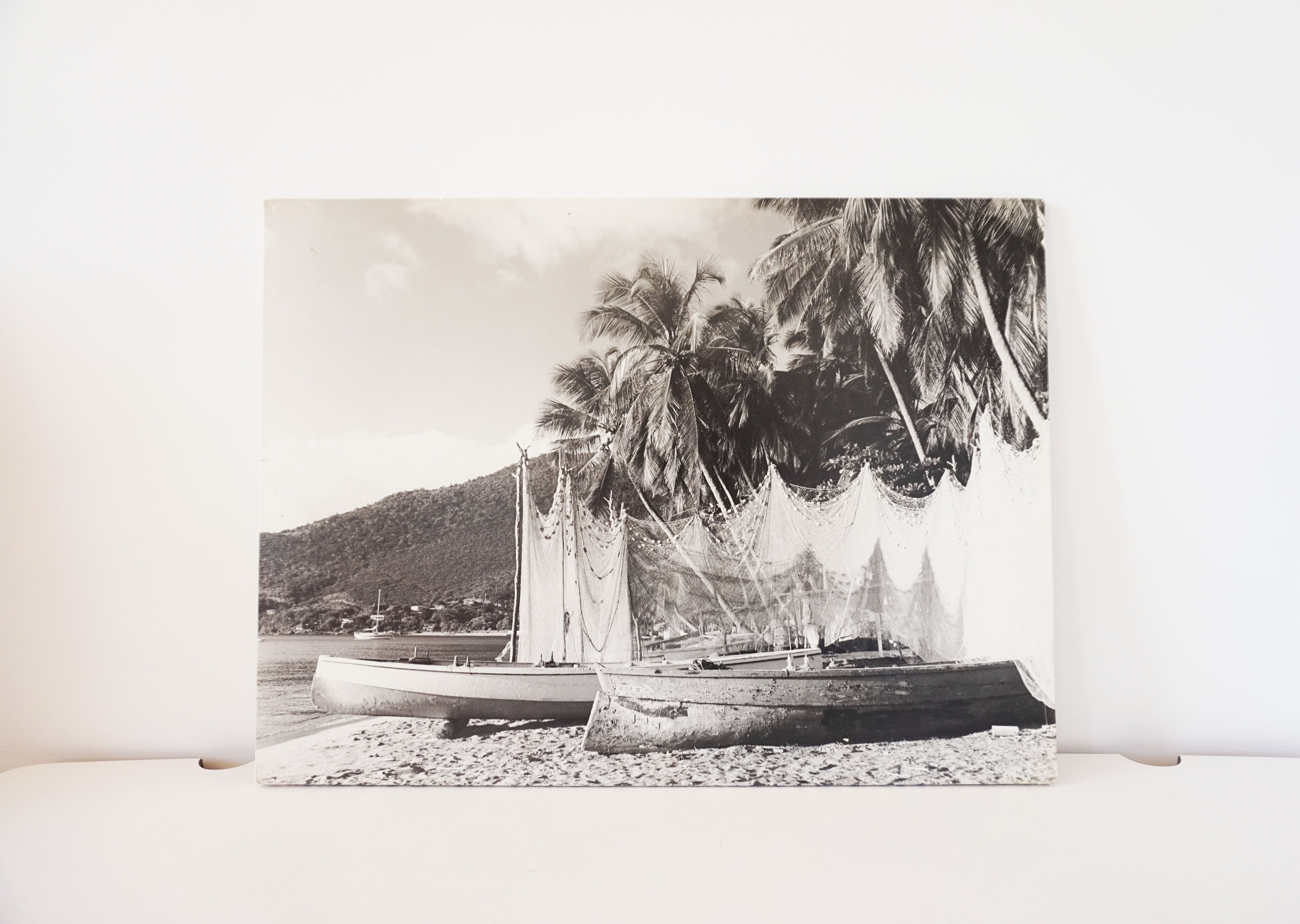 Old photograph on wood panel