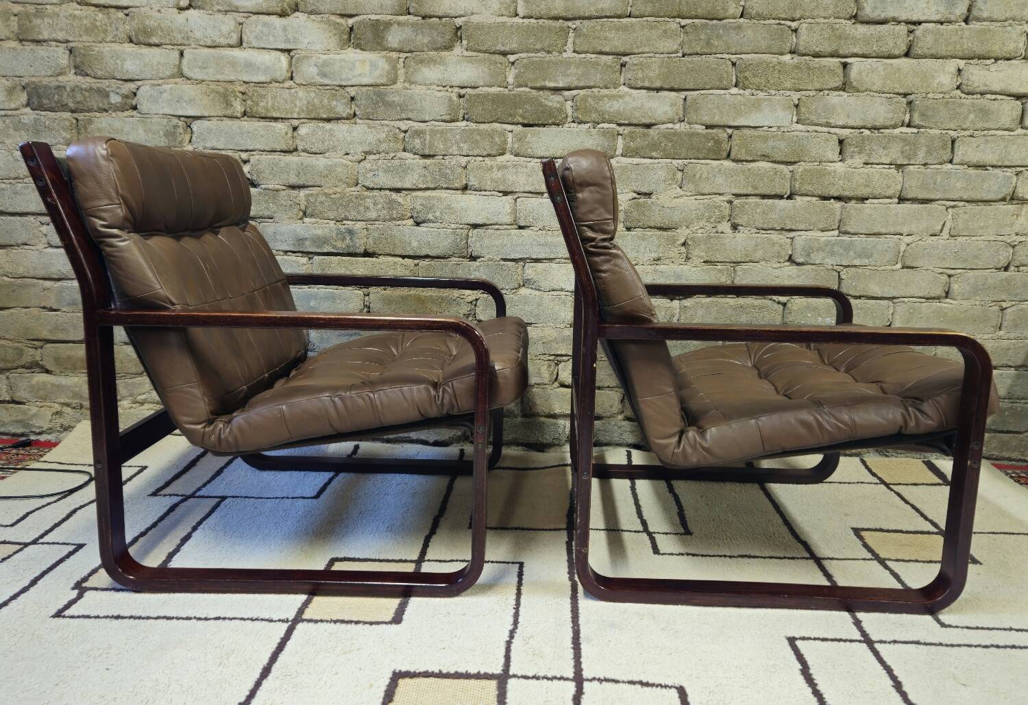 Pair of vintage 1970s faux leather armchairs