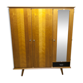 French wardrobe with tapered legs, 3 doors, 1 mirror (27*130), and 1 drawer.