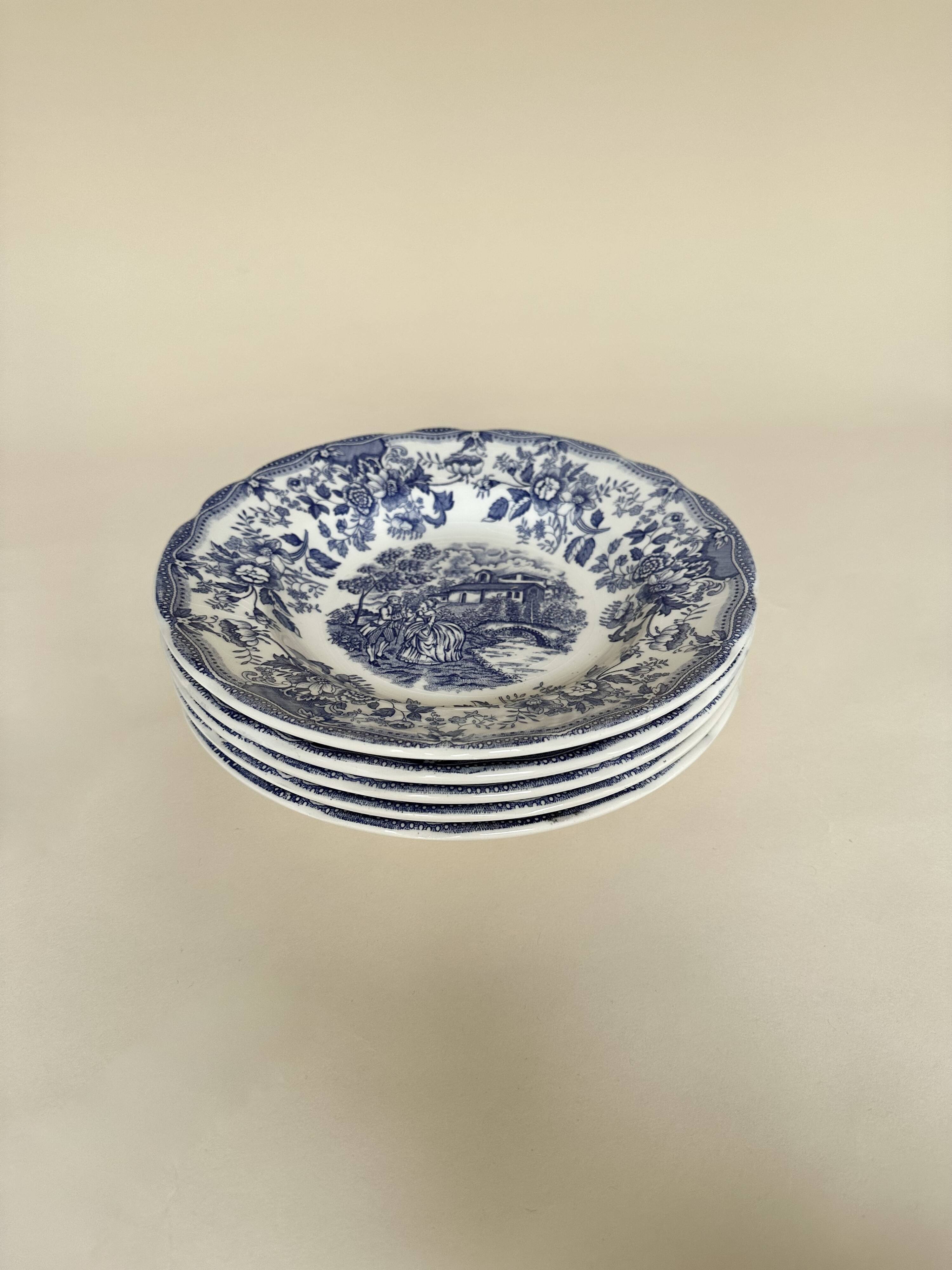 Set of five English deep plates, made of ironstone ceramic, romantic scene.