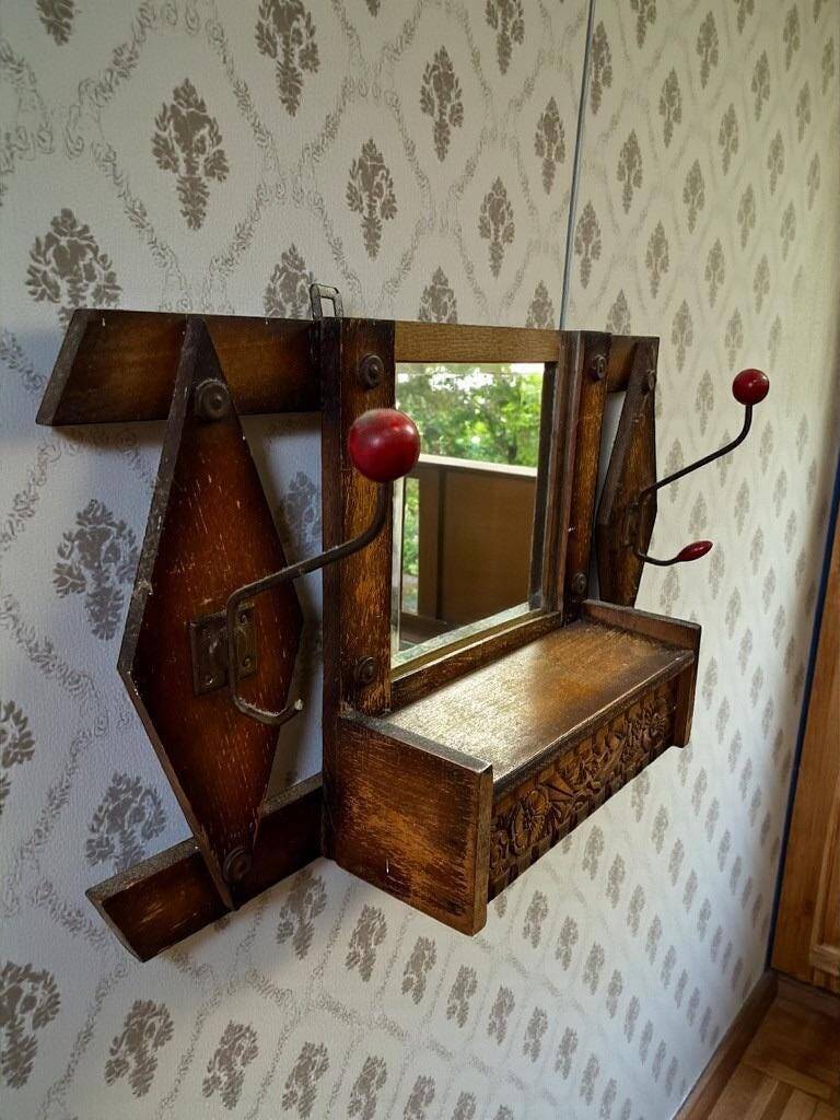 Wall cabinet with coat rack