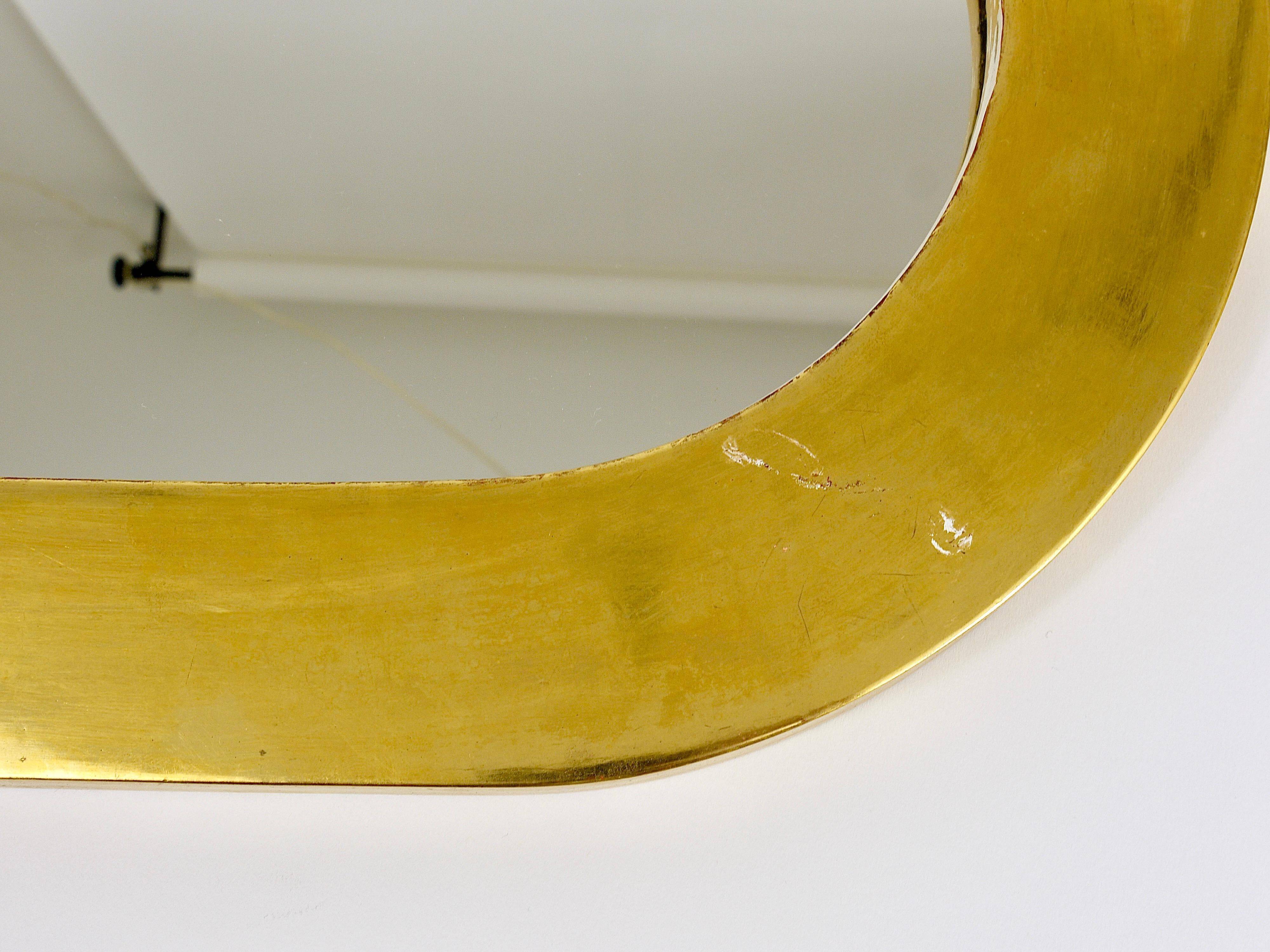 Miroir mural moderne autrichien plaqué or Carl Aubock, 1960s