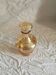Art Deco glass carafe with golden reflections
