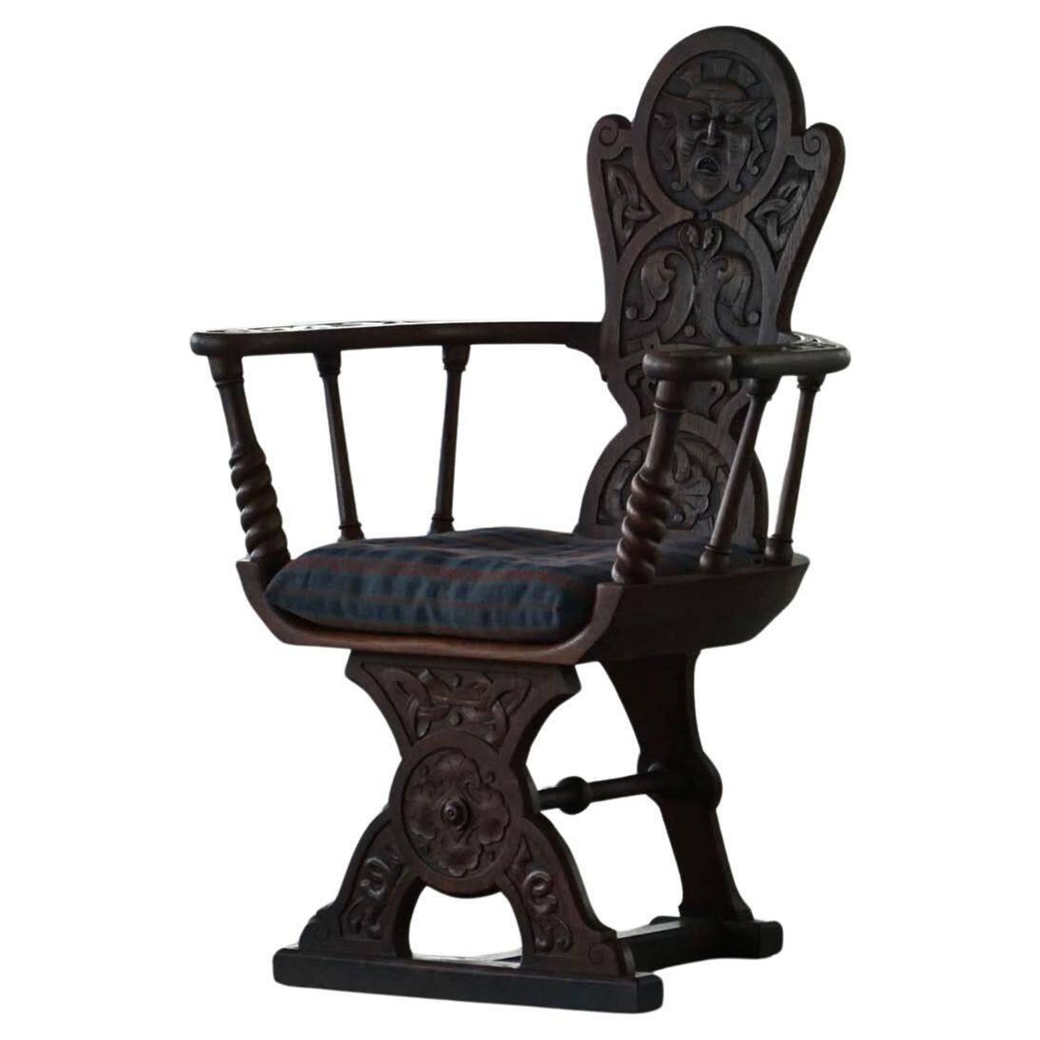 Scandinavian armchair in solid oak with cushion, folk art, early 19th century.