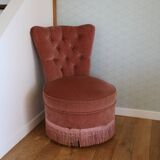 Powder pink fireside chair with fringes