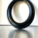 Black wooden oval frame