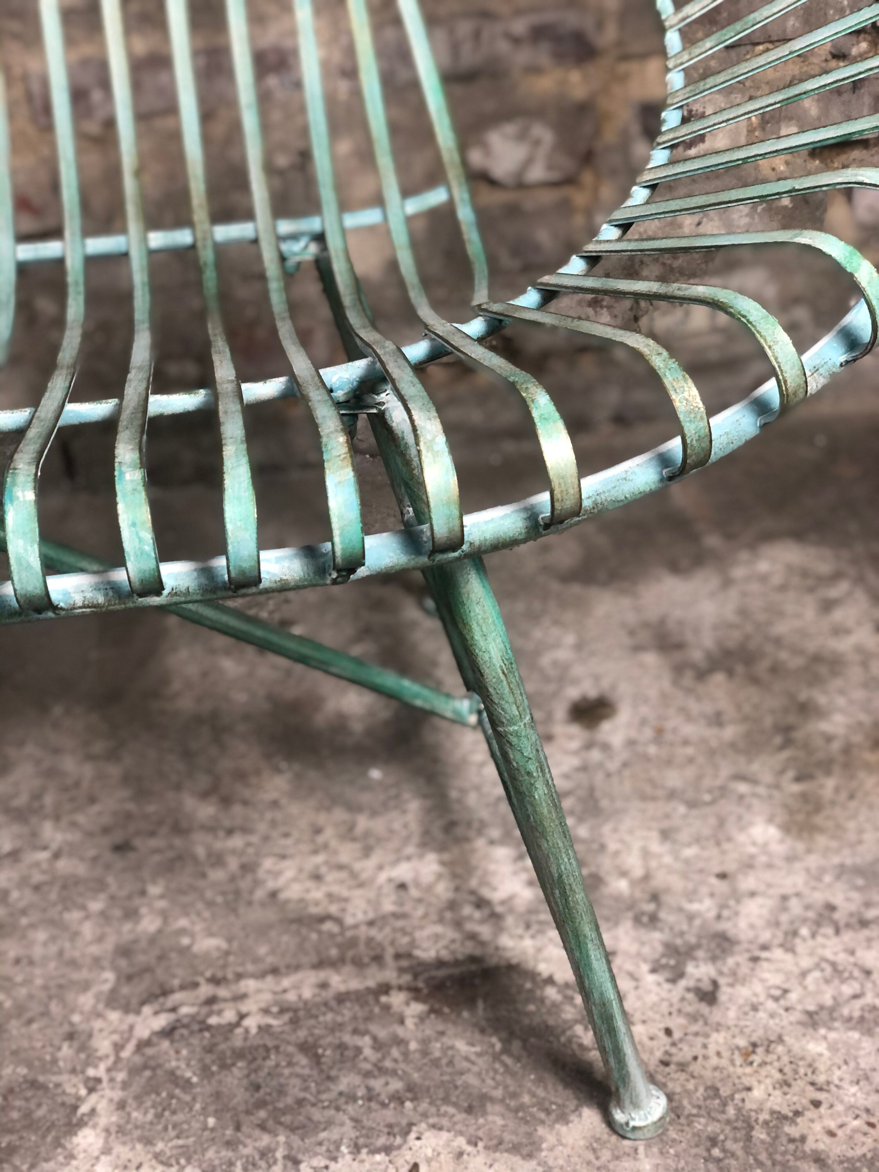 Green patinated iron garden bench